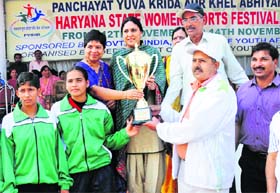 Sonepat girls being awarded the trophy for over-all performance by MLA Sumita Singh in Karnal