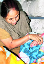 A newly born girl child, who was found abandoned at Gandhi Nagar, in police custody in Jammu on Sunday