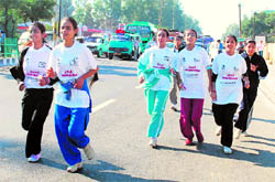 Participants of Run for India,Run for Peace, organised in connection with Childrens Day, in Jammu on Sunday