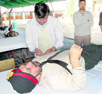 A blood donation camp under way at Anarwala on Monday