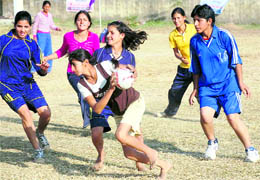 A handball match underway during a sports meet at Balawala Inter College in Dehradun on Monday