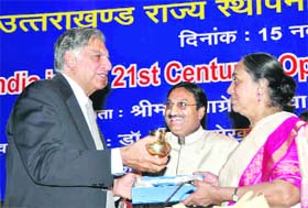 Governor of Uttarakhand Margaret Alva and Chief Minister Ramesh Pokhriyal Nishank present Ganga jal to Ratan Tata, Chairman of the Tata Group, in Dehradun