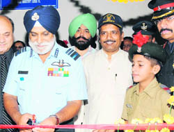 Air Marshal PS Bhangu inaugurates a lab in the NDA block of Kunjpura Sainik School on Monday.