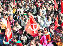 CPM activists hold a protest in Shimla on Monday
