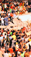 Rescue work in progress after a building collapsed in New Delhi.