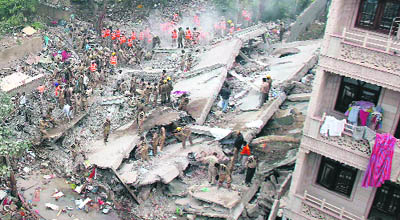 Rescue work in progress at the site in the Lakshmi Nagar area of New Delhi on Tuesday. 