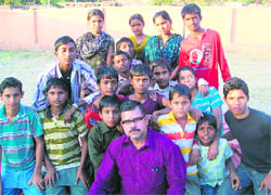 Slum children at a workshop in Vasudhaiv Katubunkam School, Rajiv Nagar, in Jammu.