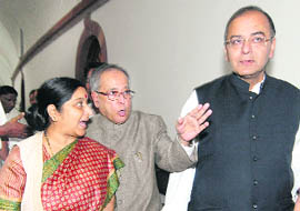 Finance Minister Pranab Mukherjee, Leader of Opposition in Lok Sabha Sushma Swaraj and Leader of Opposition in Rajya Sabha Arun Jaitley trying to make a point at the all-party meeting at Parliament on Tuesday.