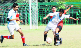 Players in action during a football match in Chandigarh on Wednesday.