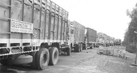Trucks in a queue to pay tax at a tax barrier on the Ambala-Rajpura road. 
