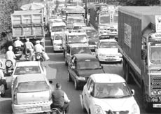 The traffic that was stalled due to an accident on the Banur-Rajpura road on Wednesday.