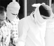 The two alleged accused being produced in court. 