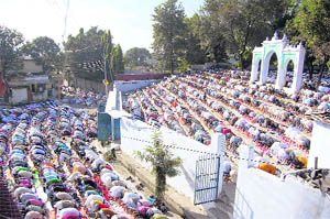 Devotees offer prayers at the eidgah