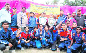 The Dehradun senior boys and girls teams that won the state-level girls handball championship pose with their trophies in Dehradun on Wednesday.