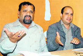 UKD chief Trivender Singh Panwar (left) addresses the media in Dehradun on Wednesday.