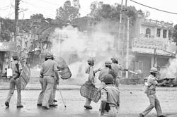 Cops lobbing teargas shells on protesters at Samba in Jammu and Kashmir.