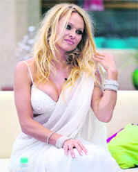 The Blonde Factor: BABE IN BIGG BOSS: Canadian model and former Baywatch star Pamela Anderson on the sets of the reality television show 'Bigg Boss' at Lonavala.  AFP