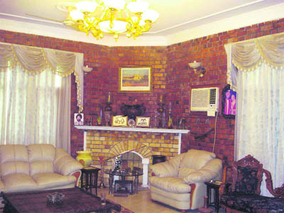 The drawing room of Singhs spells sheer elegance