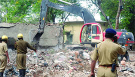 Rescue operation goes on at Laxmi Nagar in New Delhi on Thursday.