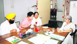 Punjab Health Minister Laxmi Kanta Chawla interacts with the staff of Mata Kaushalya Hospital in Patiala