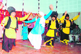 Students of DAV College present bhangra during an entertainment function in Amritsar