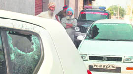 A view of the cars that were damaged during a shootout at Ballo Majra village in Kharar on Friday.