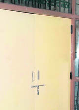 The locked door of the de-addiction centre at Phase VI in Mohali on Friday.