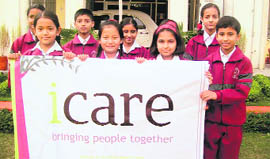Students participate Nimbu-Amla Festival in Dehradun on Friday.