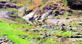 A nullah, near Rawarian Tala, where a culvert is required. Photo by the writer