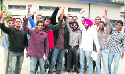 Students of MA-II English of Gujranwala Guru Nanak Khalsa College protest against the college authorities in Ludhiana on Friday.