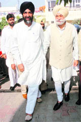 Manpreet Singh Badal and Bir Devinder Singh at the latters residence in Patiala on Friday.