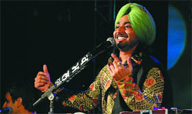 Renowned Punjabi singer Satinder Sartaj regaling audience during a concert organised at the Sports Stadium in Bathinda on Saturday evening.