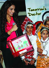 Actor Bipasha Basu with girl students of Satya Bharti School during a function organised by the Bharti Foundation in New Delhi on Saturday.