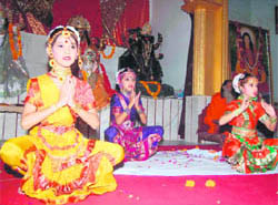 Children perform the kathak in Haridwar on Friday.