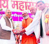 Chief Minister Bhupinder Singh Hooda being presented with a memento during a Gau Raksha Sammelan in Panipat on Saturday.