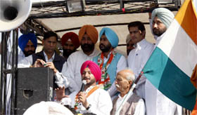 Congress MP from Anandpur Sahib Ravneet S. Bittus Nav Inquilab Pad Yatra reached Faridkot on Saturday where Kotkapura MLA Ripjeet Brar (in orange turban) welcomed him at village Khara.