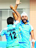 Sandeep Singh celebrates his second goal on Saturday.