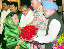 President Pratibha Patil being seen off by Prime Minister Manmohan Singh before her departure on a state visit to the UAE and Syria, at the Rashtrapati Bhavan in New Delhi on Sunday