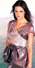 Brazilian model Alessandra Ambrosio presents a creation by Alexia Ulibarri during a fashion show in Cancun on Sunday