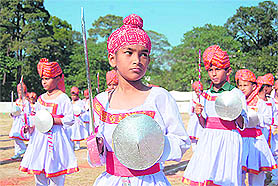 Students display a martial dance at the annual day function of Doon Blossom School in Dehradun on Sunday.