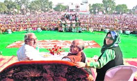 CM Bhupinder Singh Hooda (left) with Congress leaders at a rally in Bhiwani