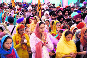 Devotees pay obeisance at Gurdwara Shri Guru Nanak Devji, Chand Nagar, Jammu on Sunday.