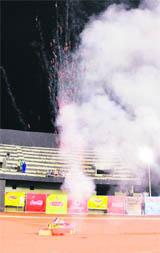 Organisers violate rules by bursting crackers on the athletics track during the PPL match.