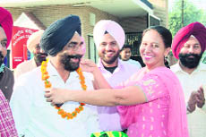 Dr Narinder Singh Sidhu being honoured after winning the Panjab University Senate byelection. 