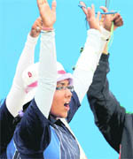 Dola Banerjee celebrates after learning that the team had won the bronze medal in the women's archery team final on Sunday.
