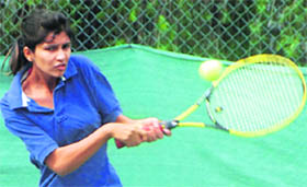 A player in action during the AITA championship organised by the Chandigarh Lawn Tennis Association in Chandigarh on Monday