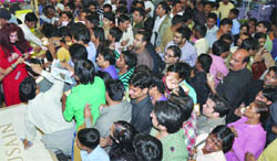 Beautician Shahnaz Hussain obliges fans with autographs at India International Trade Fair at Pragati Maidan in New Delhi
