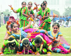 School kids perform at the opening ceremony of the 24th state-level sports meet of primary schools in Gurgaon