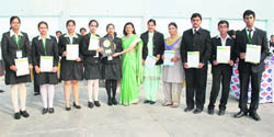 Suman Nijhawan, principal-cum-regional director, DAV schools, with prize-winning students