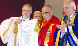 The Dalai Lama with Union HRD minister Kapil Sibal and IGNOU vice-chancellor Najeeb Jung in New Delhi on Tuesday.